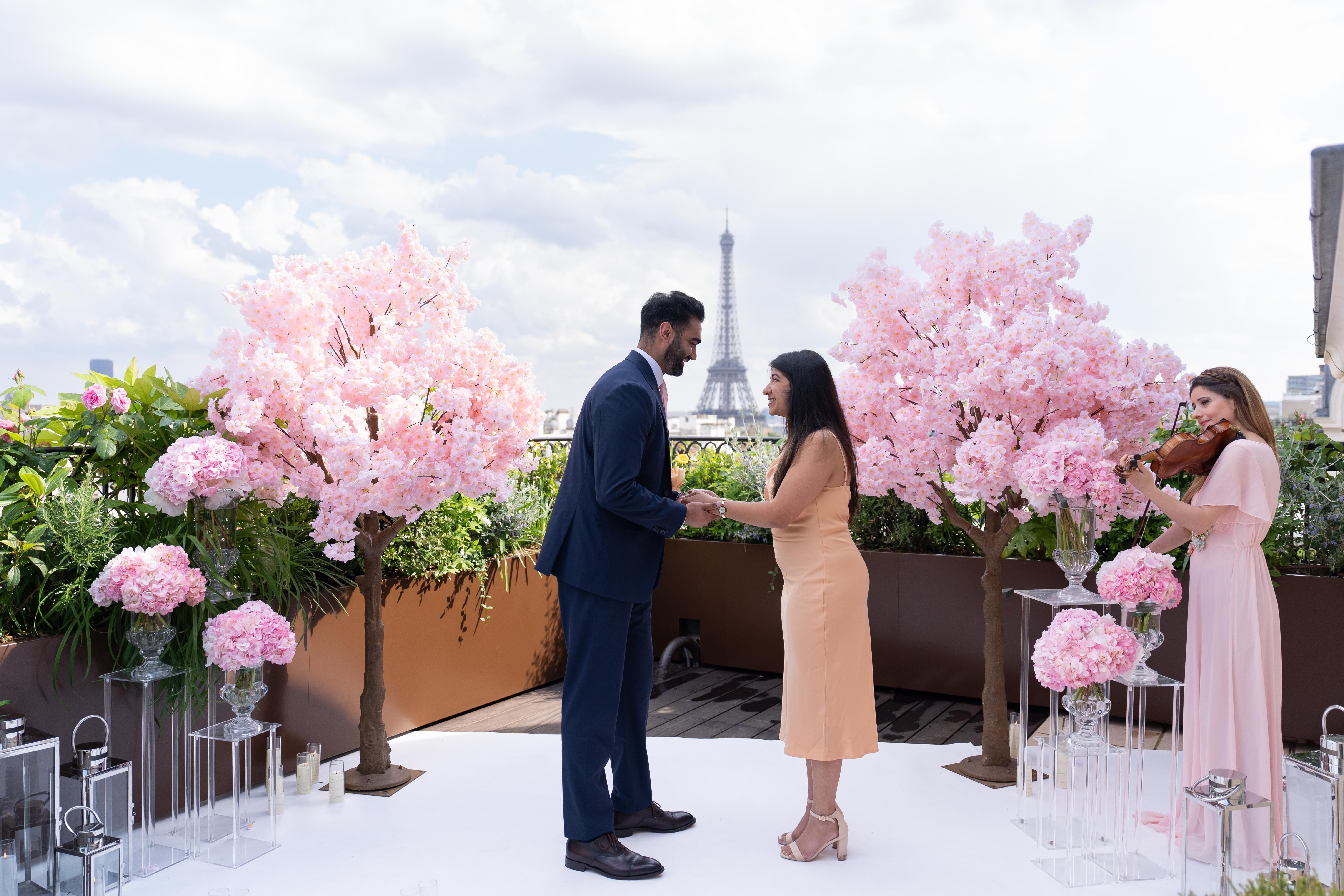 cherry-blossom-proposal-peninsula-paris-white-carpet-violinist.jpg
